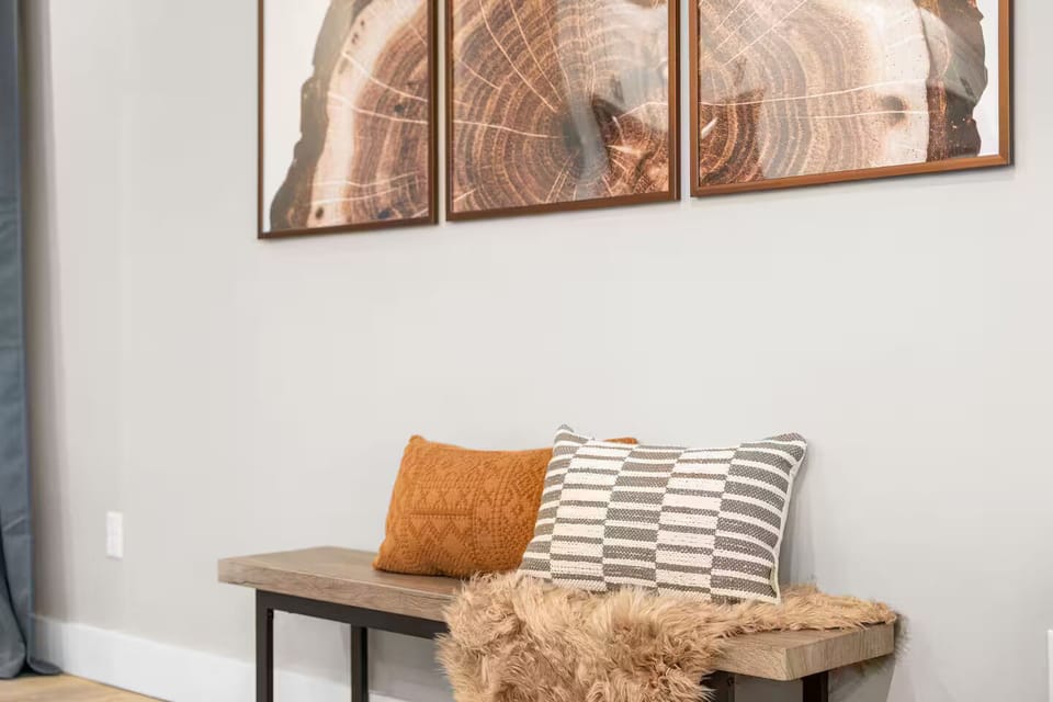 Entryway Charm: Brighten your arrival with stylish seating and artistic accents.