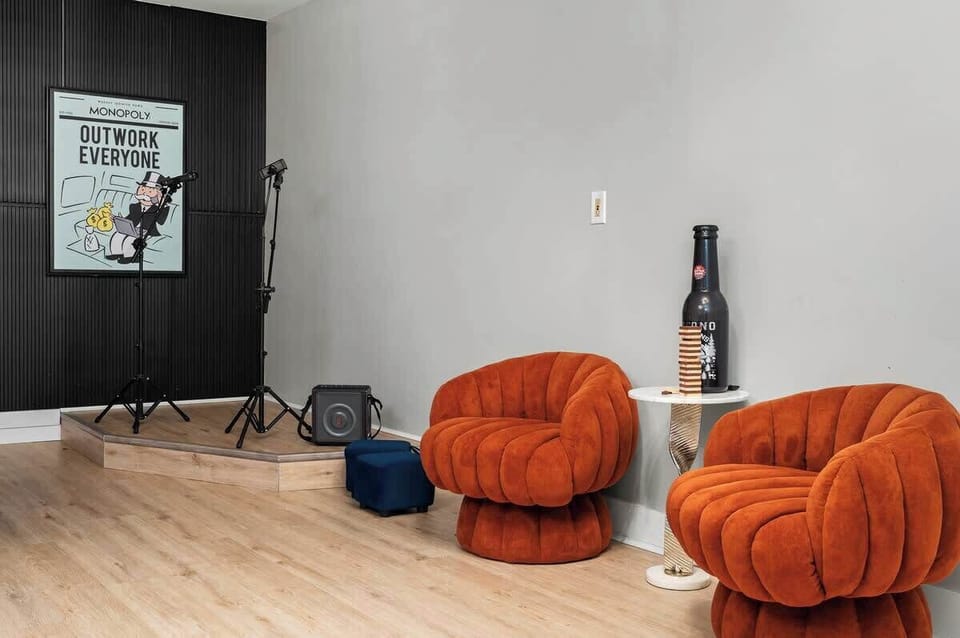 Cozy lounge area w/ plush seating, perfect for relaxing between games.