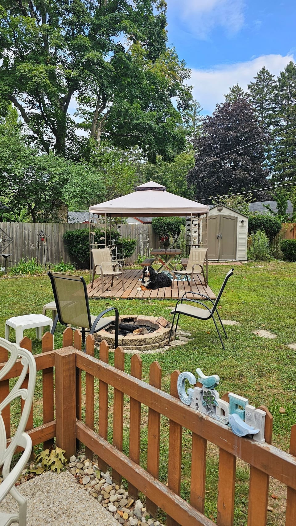 Fully fenced dog friendly backyard with Gazebo and Firepit 