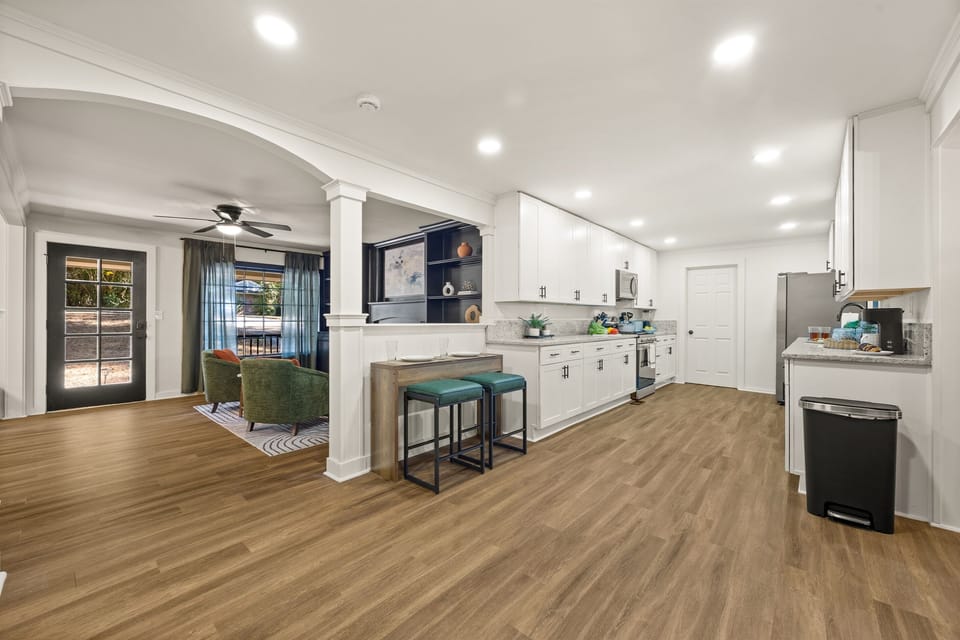 Cook just like at home in a fully stocked kitchen equipped with everything you need - including a slow cooker, blender, and all the essentials to prepare full meals. Perfect for quick breakfasts, family dinners, or longer stays that call for real living.