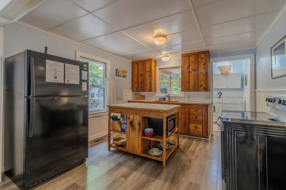 Kitchen - Kitchen and laundry room where the entry to the cabin is.