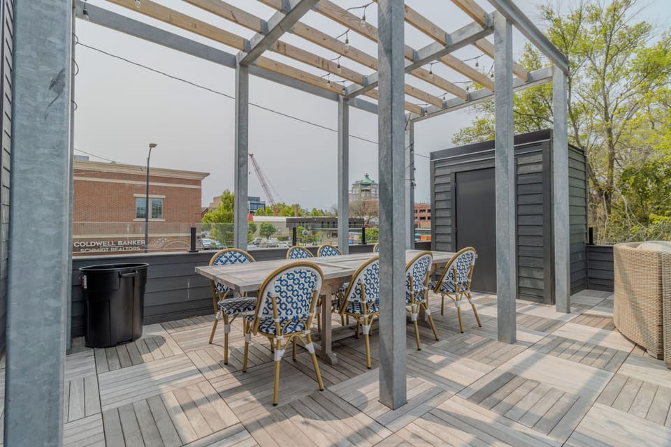 Exterior - Upper - The upper unit has a rooftop balcony accessed via dining room walkout. The balcony overlooks downtown Traverse City, the Boardman River, and Lake Michigan.
