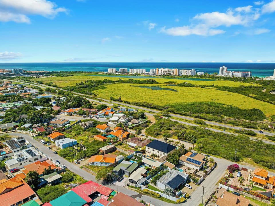 Aerial view of the house located very near to the beach.