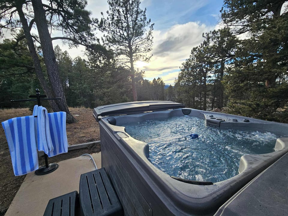 Relax under the stars in the hot tub.