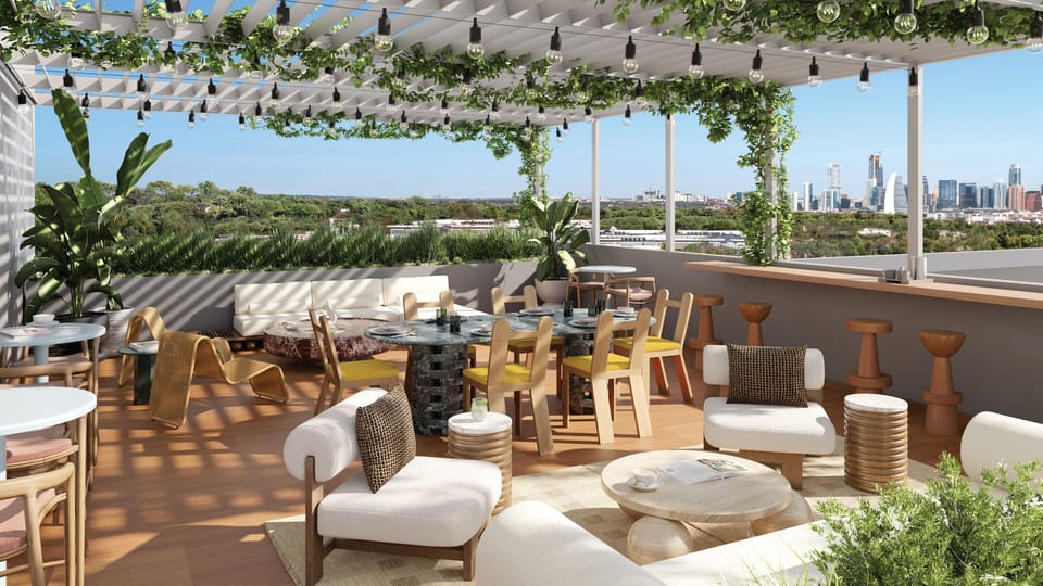 Shared rooftop terrace with skyline views.