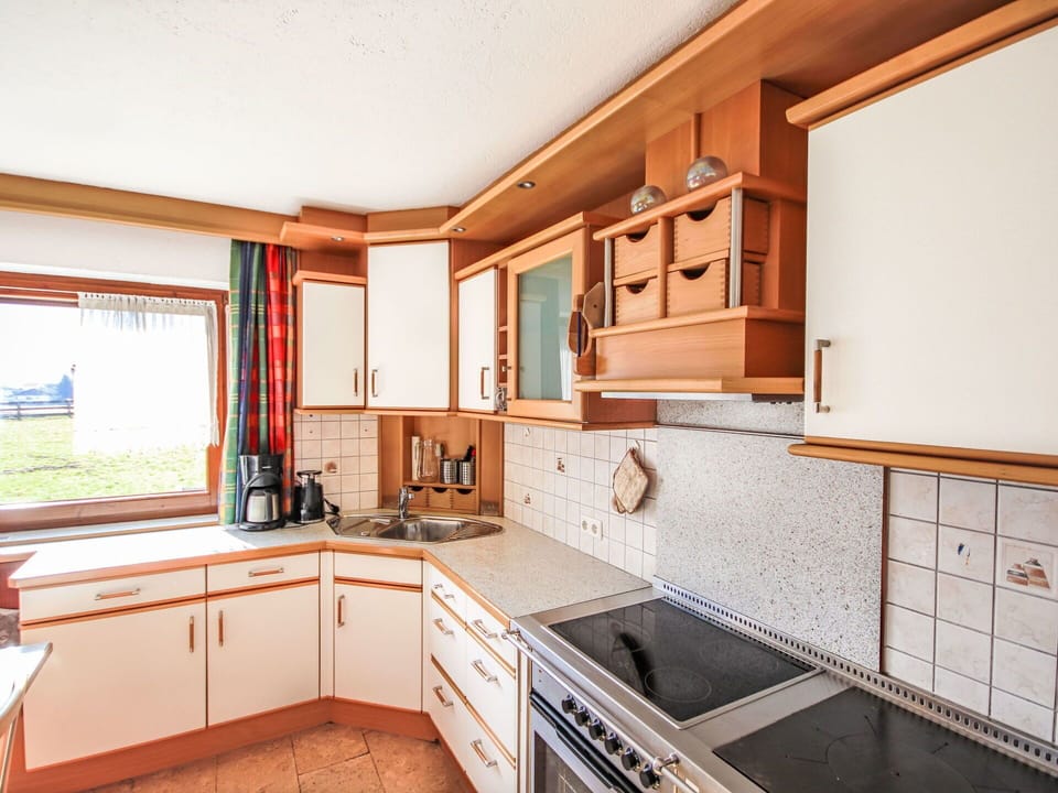 Wood, Kitchen, Interior Design, Flooring, Ceiling, Countertop, Cabinetry, Floor, Home, Room
