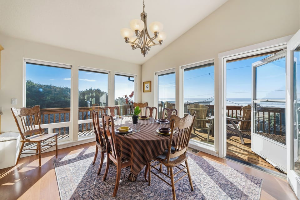 Dining room with ocean views. Additional seating at the breakfast bar.
