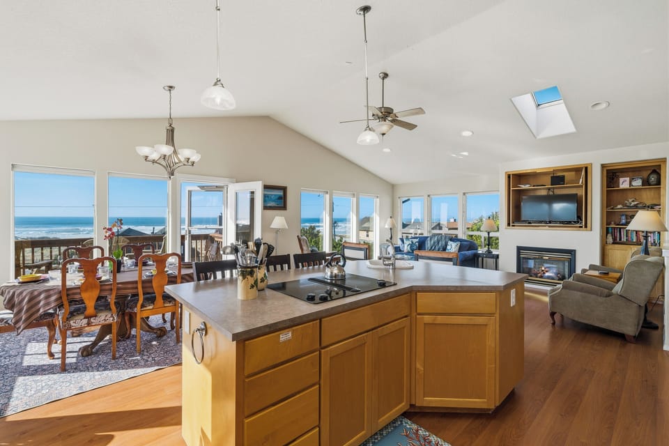 Kitchen with breakfast bar and ocean views.