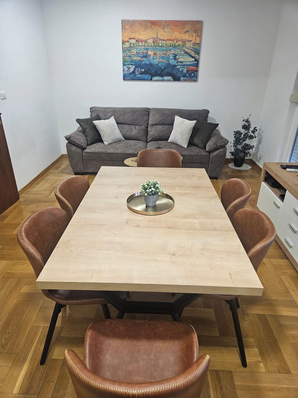 Elegant and modern dining table with a clean, contemporary design.
