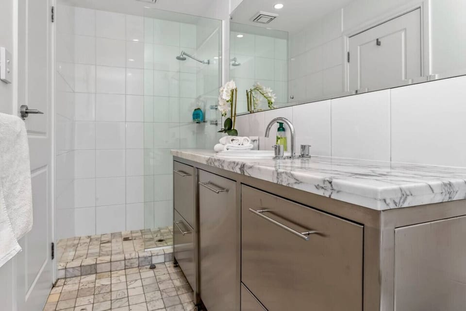 Modern bathroom with clean lines and full amenities