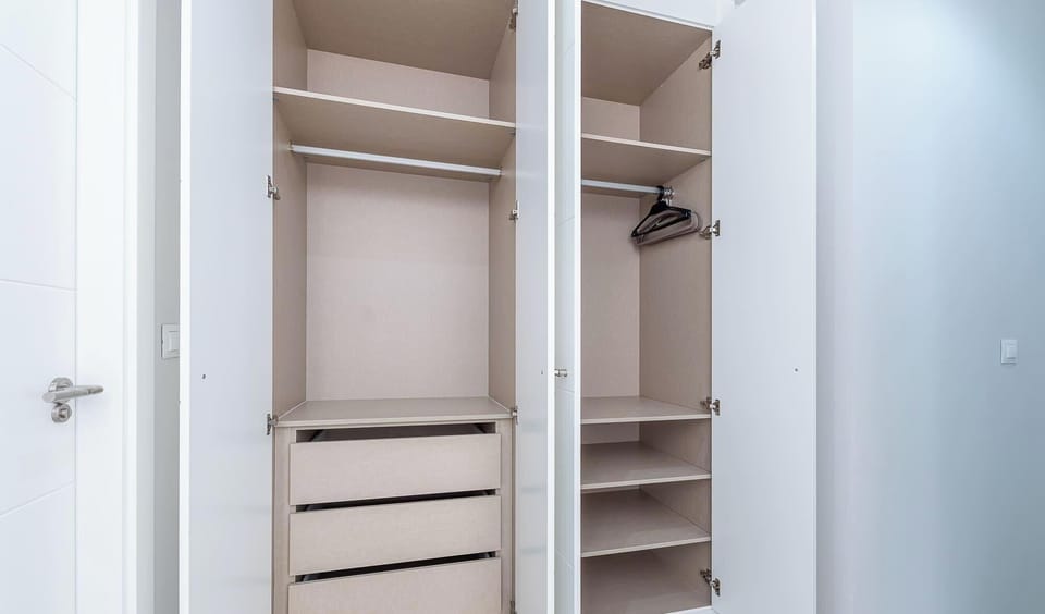 Clothing storage space for guests.
