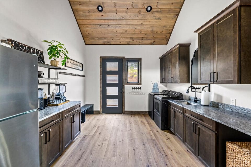 Convenient laundry room with full-size washer and dryer for extended stays