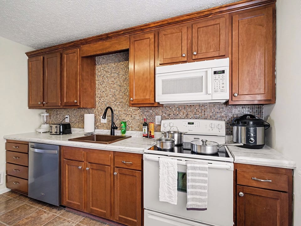 The kitchen is fully equipped and designed to make cooking easy and enjoyable.