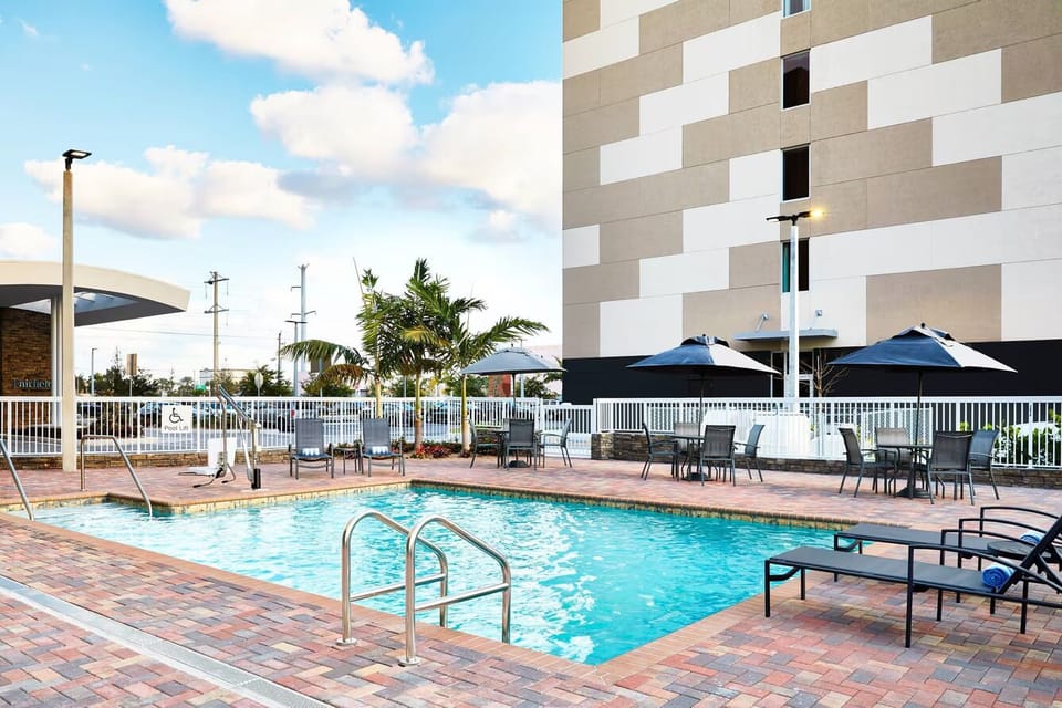 Dive into sunshine and unwind on poolside loungers.