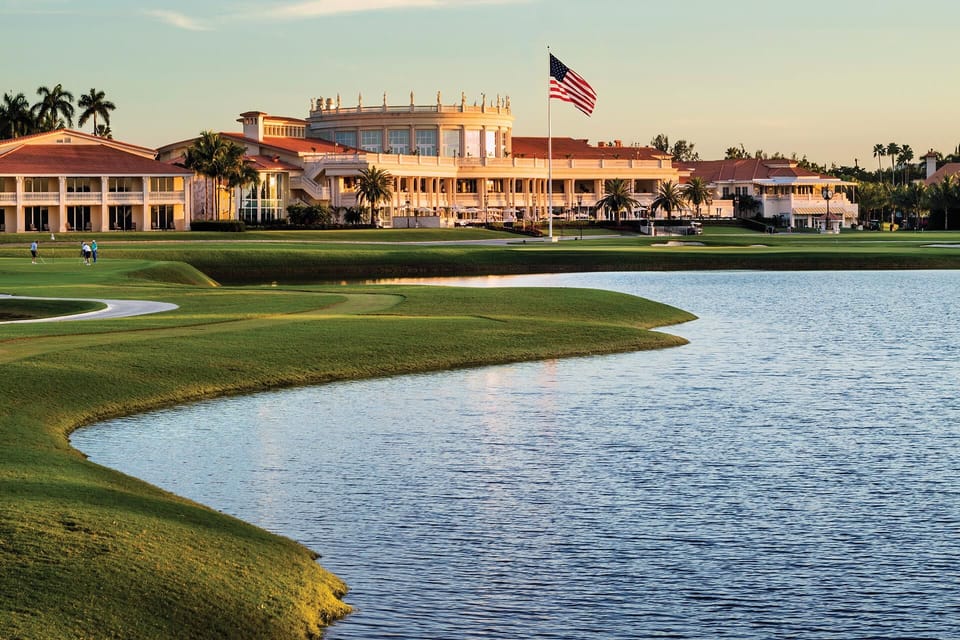 Unwind lakeside as golden sunsets frame a grand resort façade