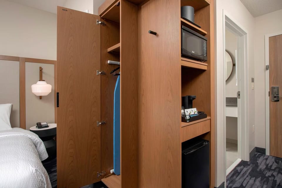Refresh and recharge with convenient storage, fridge, and microwave.