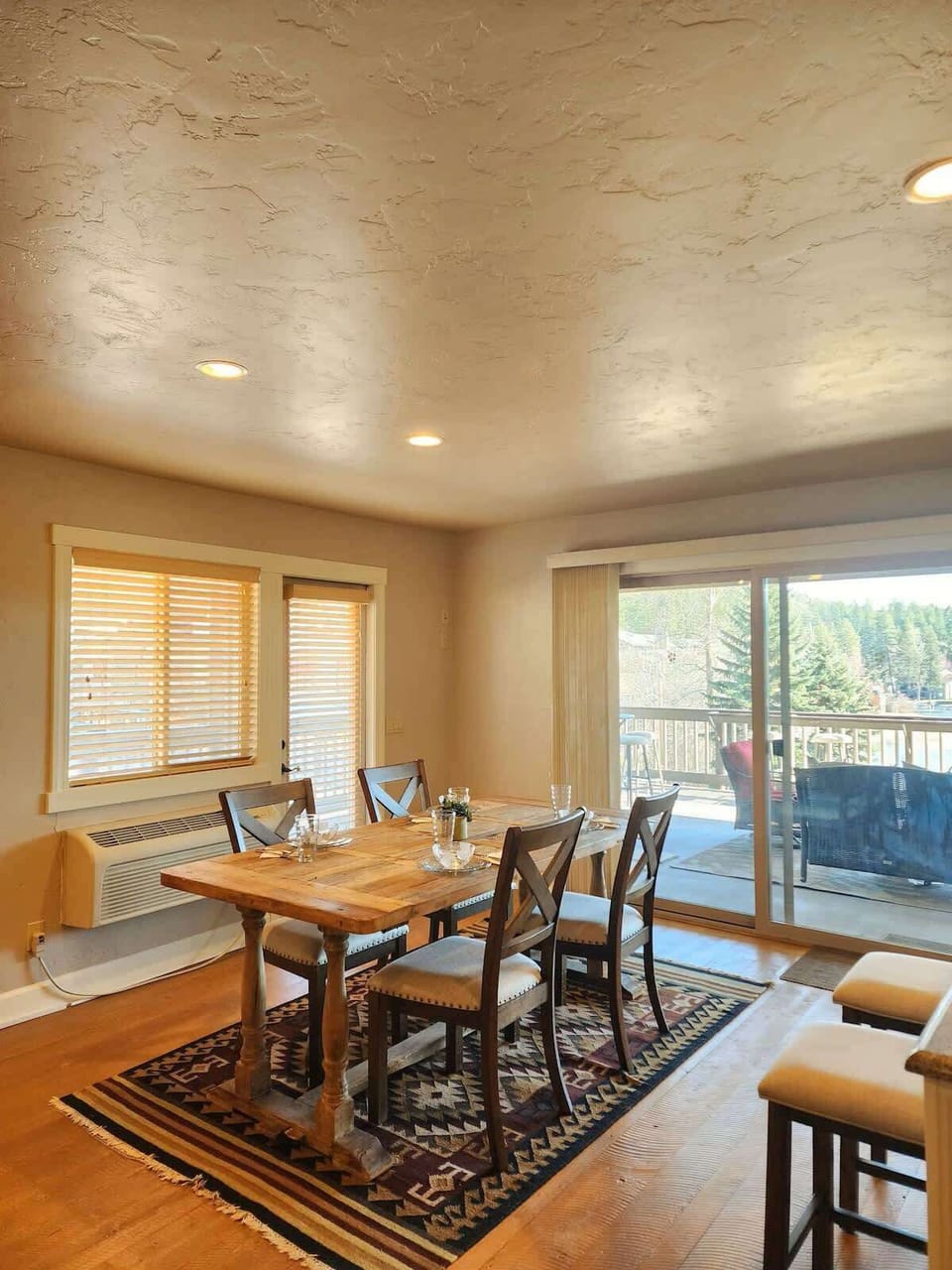 Dining area and sliding glass door to deck