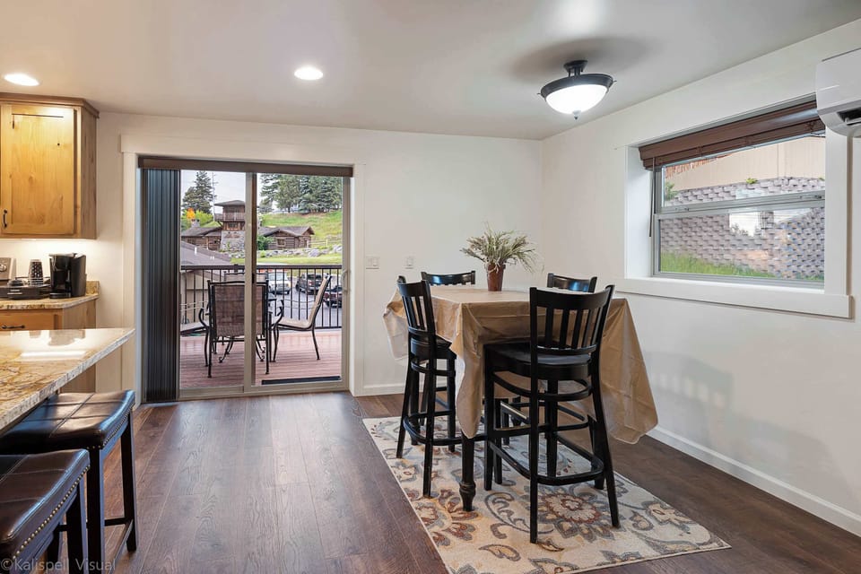 Dining Area with sliding glass entry to the balcony.
