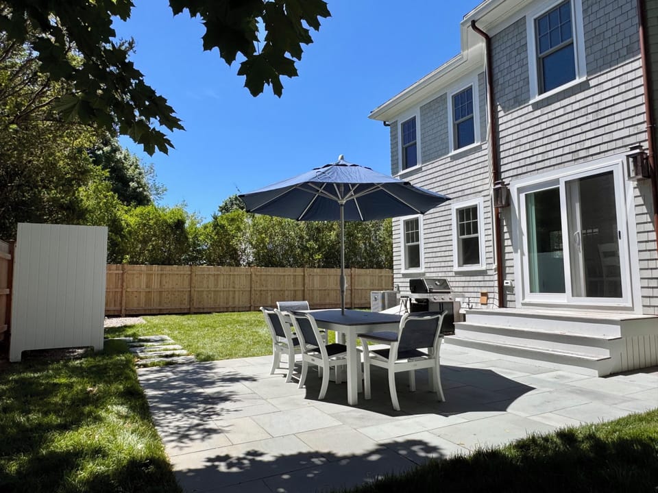 Back patio; table to seat 6, outside shower and grill.
