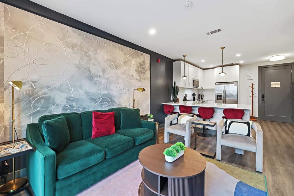 Open living area with sofa sleeper and smart TV