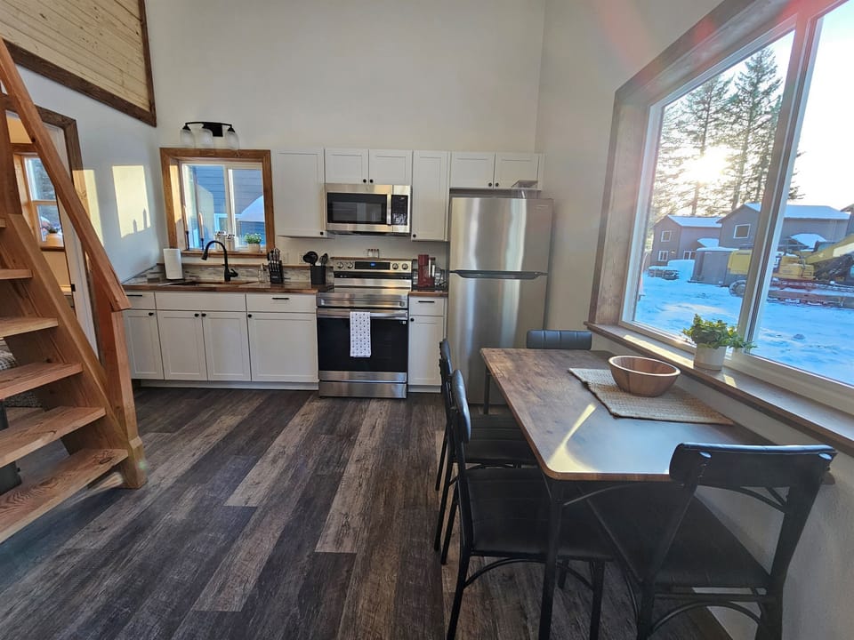 Downstairs (cabin is still being furnished, dining table will seat 4 but may look different.)
