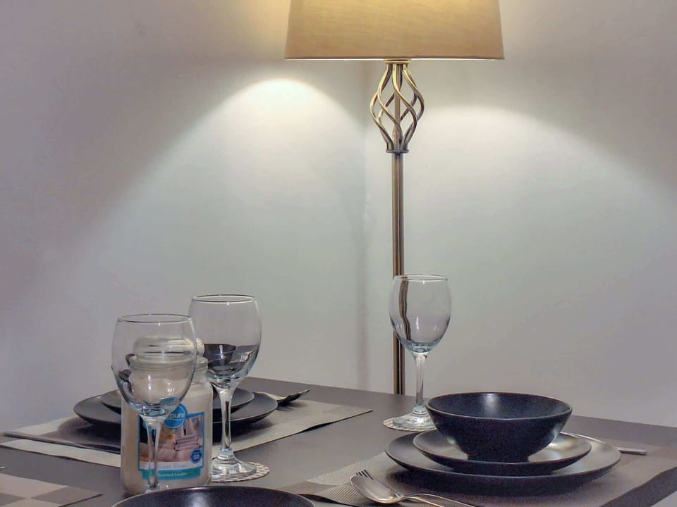 Dining table set and ready for meals, whether eating together or working remotely in comfort.