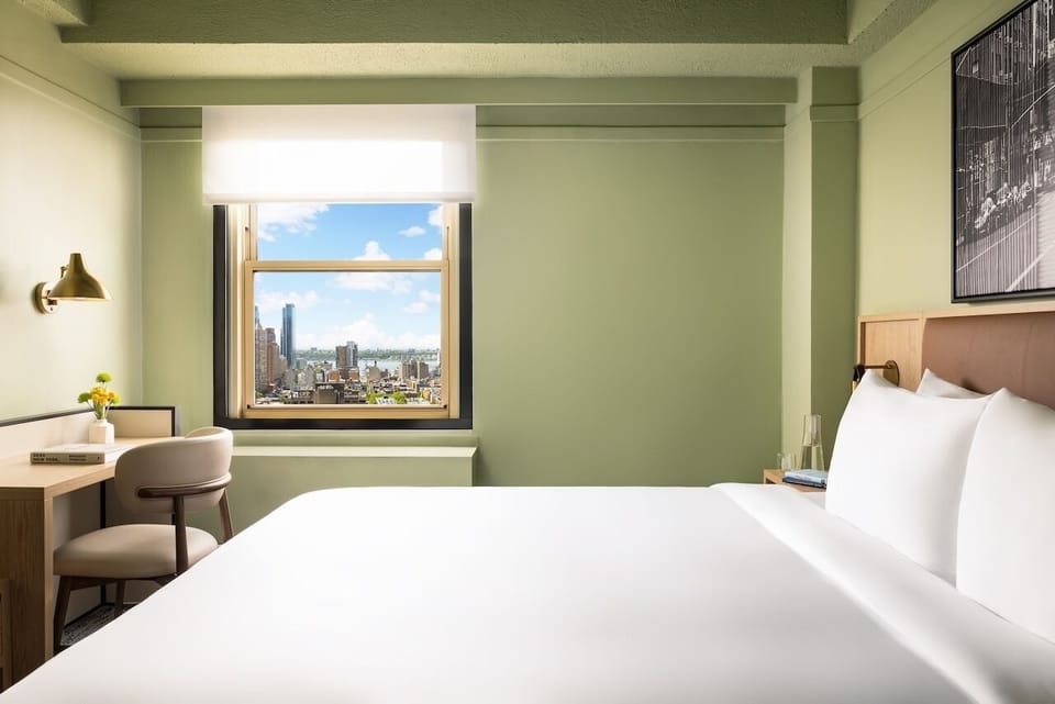 Sip morning coffee by the window with sweeping city views.