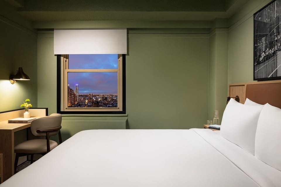 Drift off as city lights sparkle outside your window.