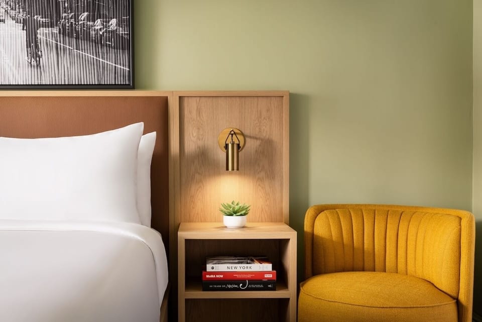 Unwind with warm reading light and a cozy accent chair.
