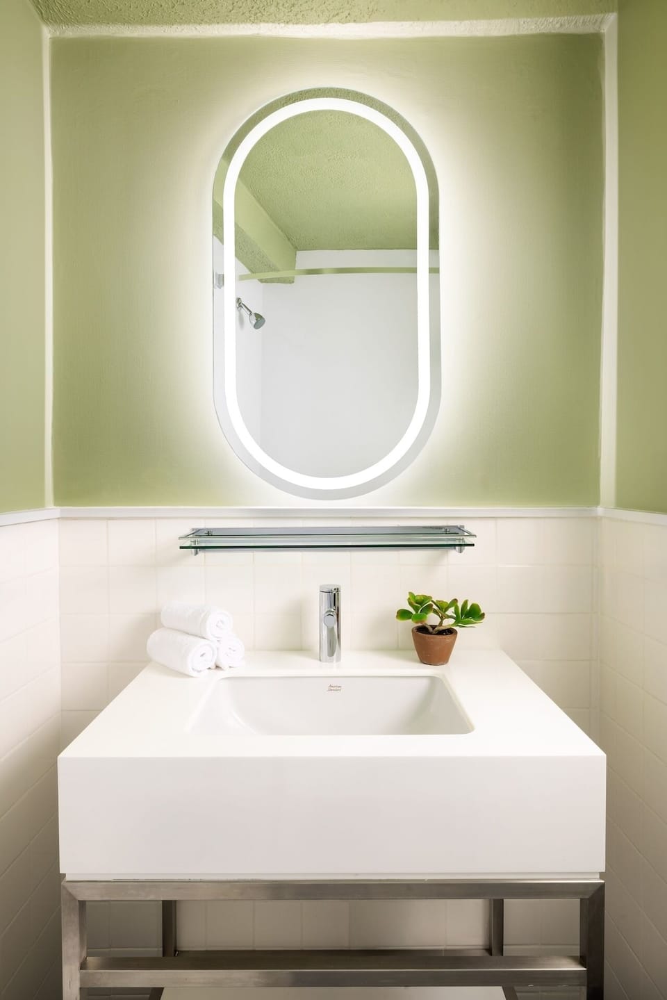 Start your day with bright, spa-like lighting and fresh towels.