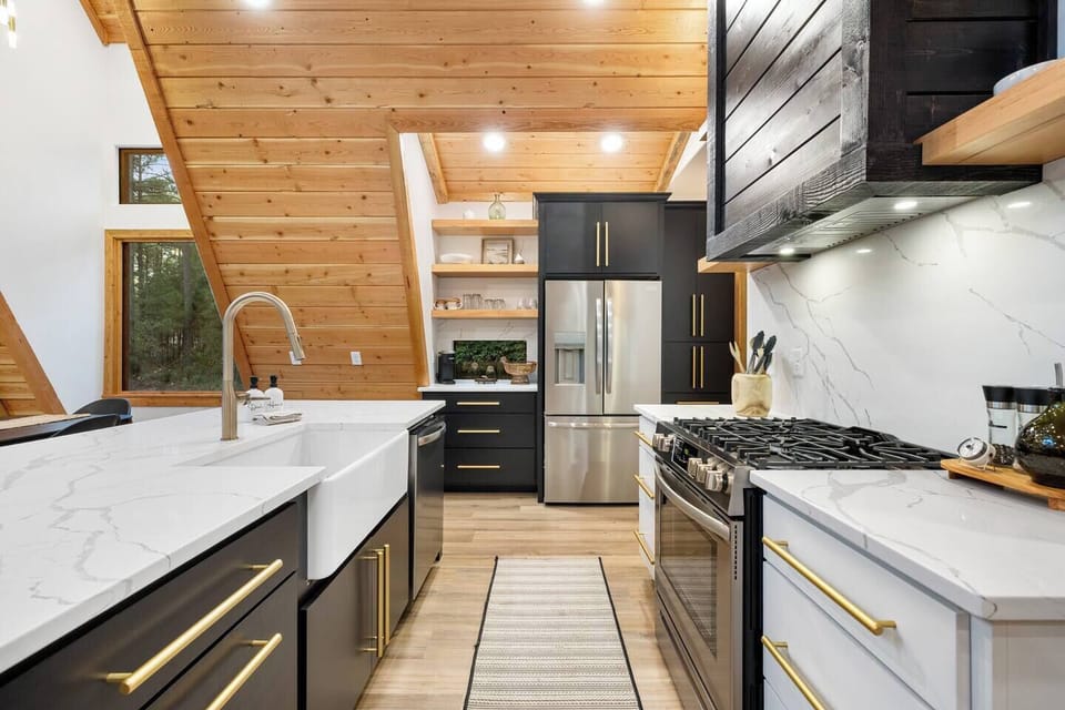 Modern kitchen with farmhouse sink and sleek stainless appliances