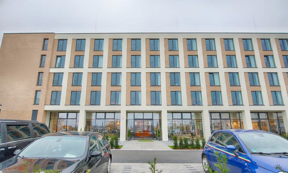 Picture your stay at this contemporary, light-filled building.