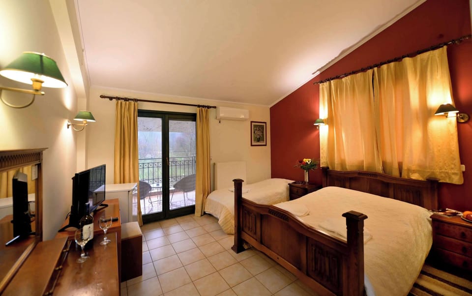 Warm and Comfortable Double Bedroom with Wooden Floors and balcony access