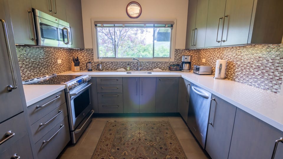 Cook comfortably in the updated kitchen with generous counter space.