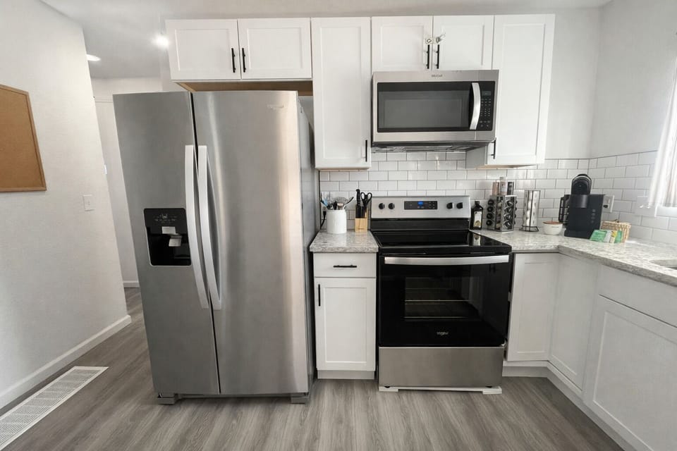 Kitchen with Full Size Refrigerator, Stove & Microwave
