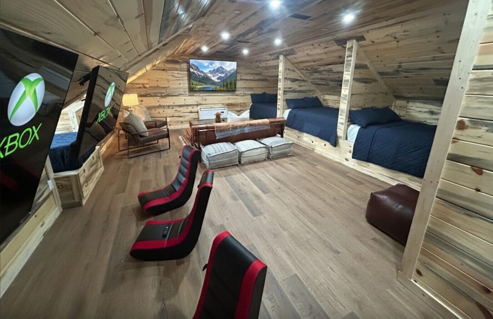 Upstairs kids room with 3 TV's and 2 XBoxes