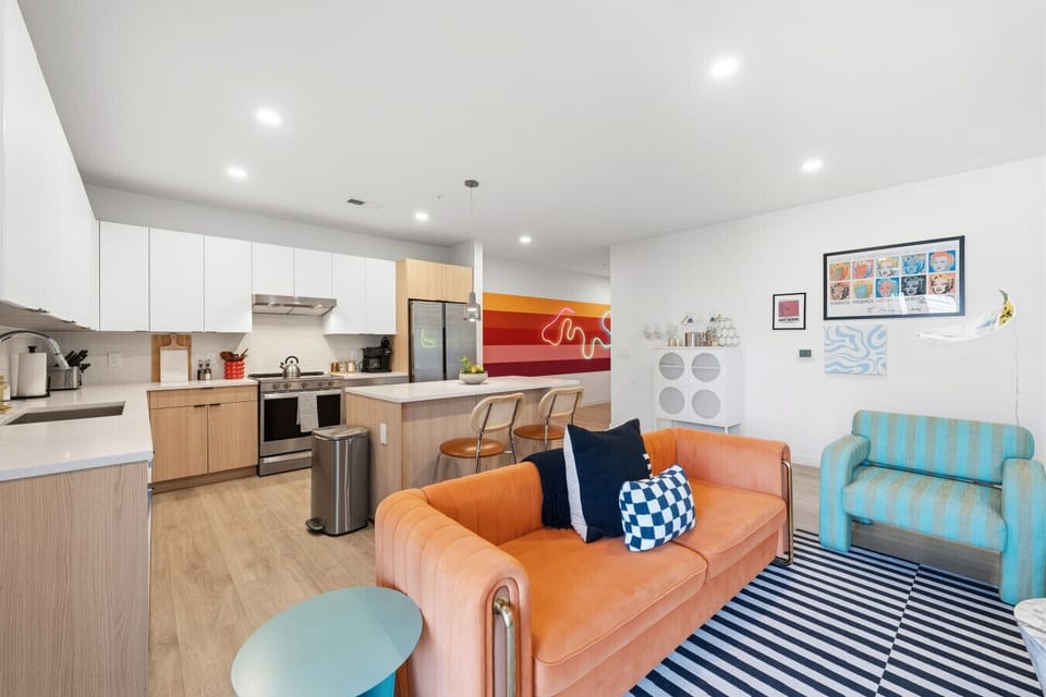Expansive wraparound balcony accessible from living room