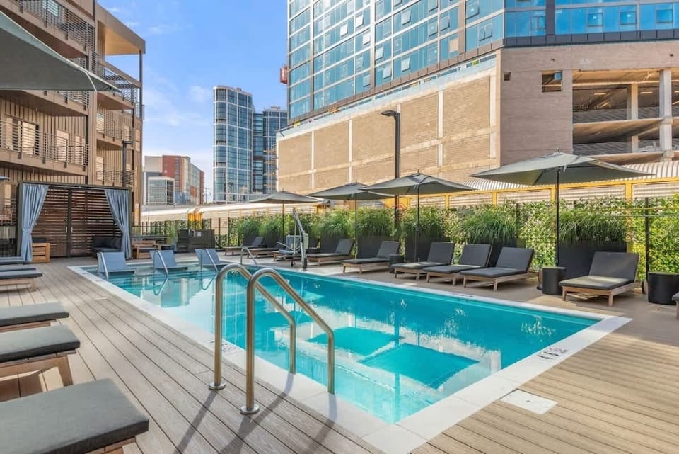 Community Pool w/ cabanas and lounge chairs - OPENS MARCH 1st!