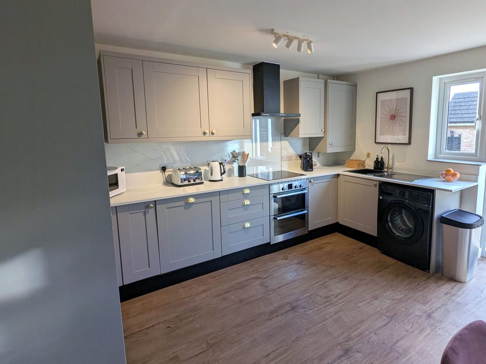 Fully equipt kitchen including dishwasher, coffee machine, washer a tumble dryer