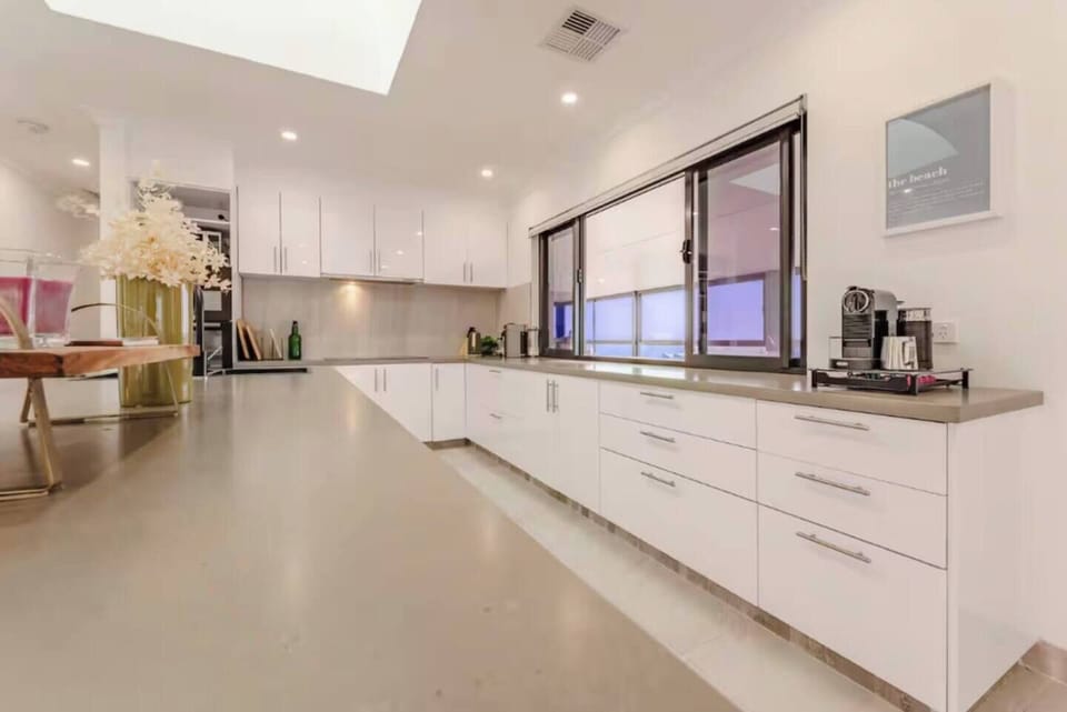 A bright kitchen area ready for preparing home-cooked meals.