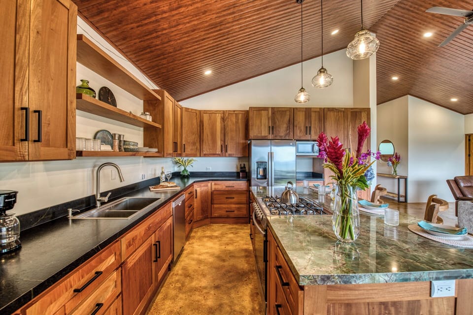 The large gourmet kitchen with stunning countertops will make meal prep a breeze.