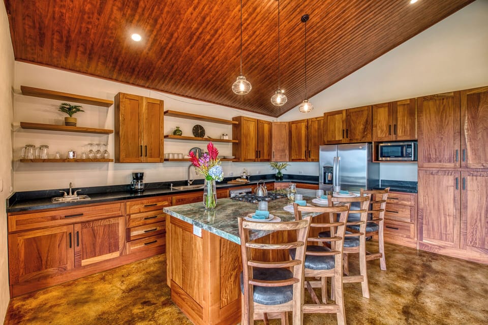 Seating for 4 at the island while chef prepares.