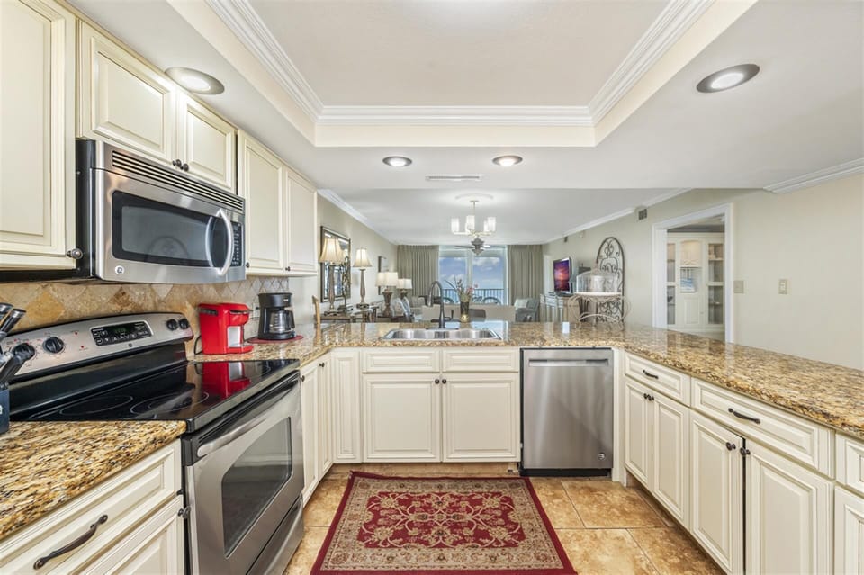 Your gourmet kitchen awaits with granite counters, stainless appliances, and plenty of space for cooking memorable meals together.