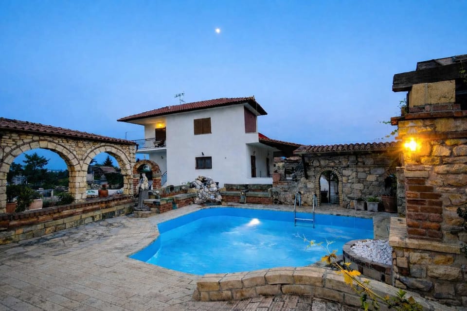 Full view of the pool area showing the spacious outdoor setting for relaxation and leisure.