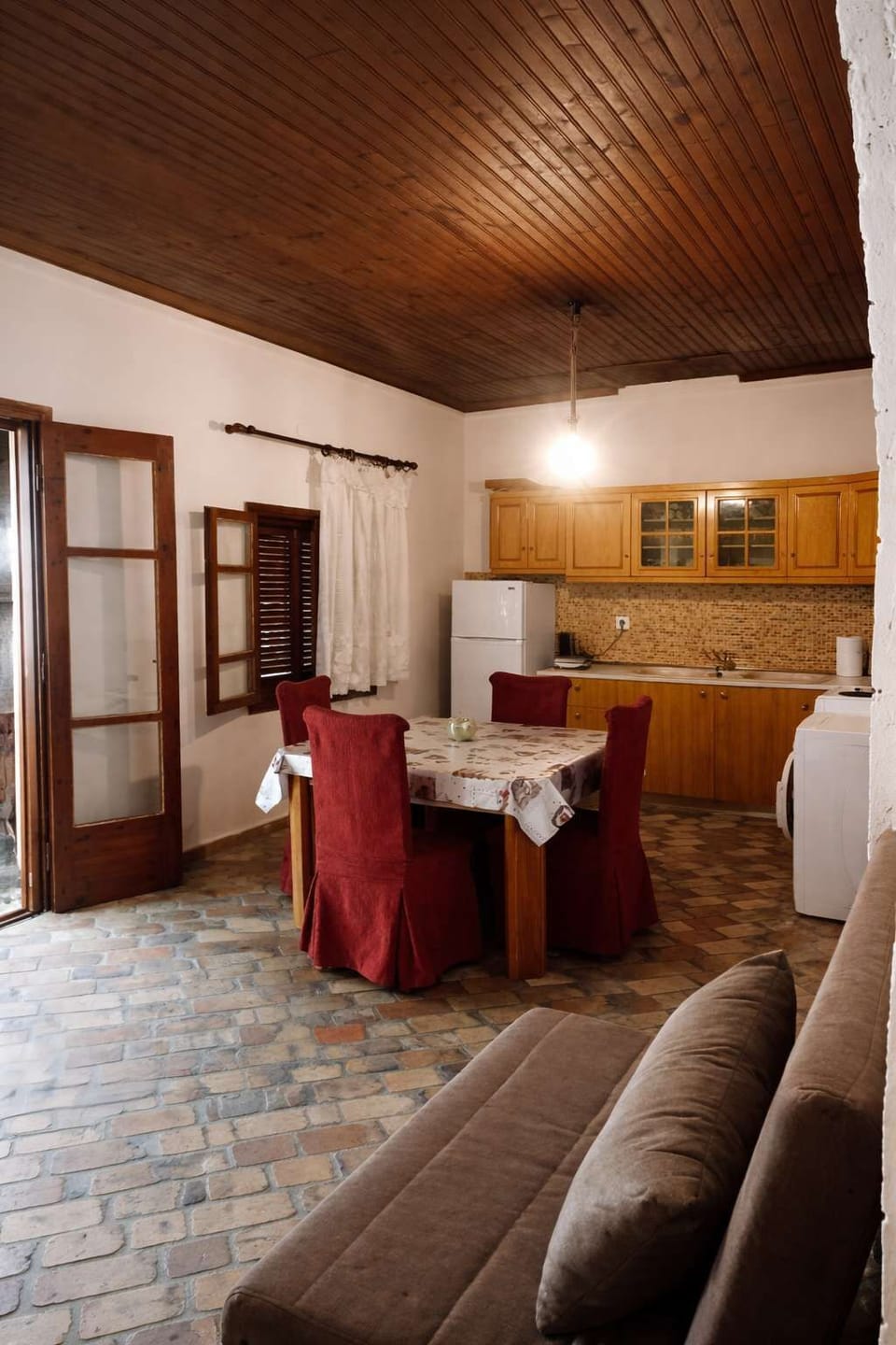 Open living and dining space connecting the main areas of the apartment for comfortable indoor living.