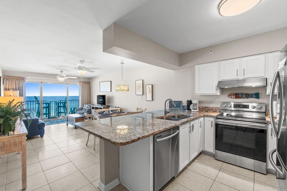 Spacious kitchen with modern appliances, perfect for home-cooked meals