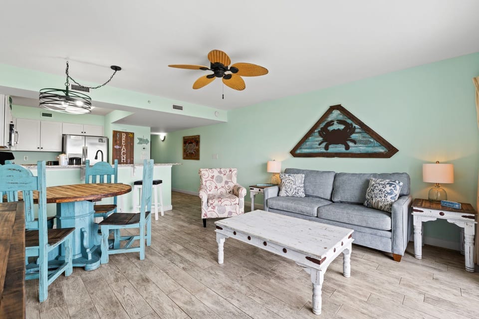 Living Area - Balcony Access - Sleeper Sofa - Ocean and Pool View - Cable & Smart TV - Dining Area