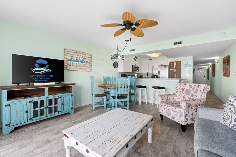 Living Area - Balcony Access - Sleeper Sofa - Ocean and Pool View - Cable & Smart TV - Dining Area