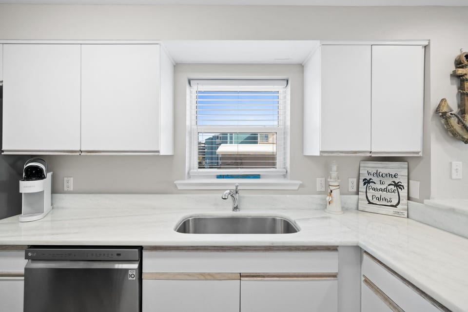 Well-appointed kitchen with a window offering natural light and great views