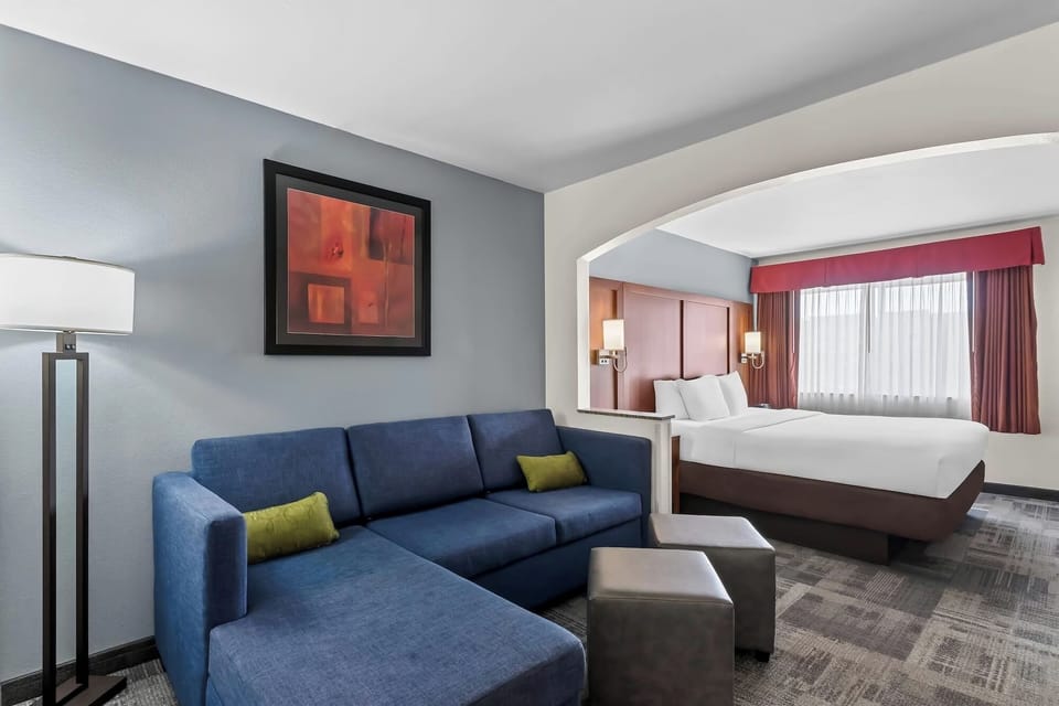 Relax on the sofa while the bedroom stays quietly separate.